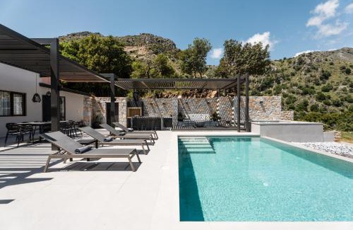 Asigonia Villa | Indulge at Eumelia Iconic Villa with Heated Pool & Ocean View