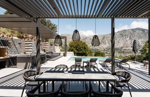 Asigonia Villa | Indulge at Eumelia Iconic Villa with Heated Pool & Ocean View