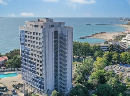 Olimp Apartment | Experience Euphoria Olimp: 4-Star Stay with Pool Access