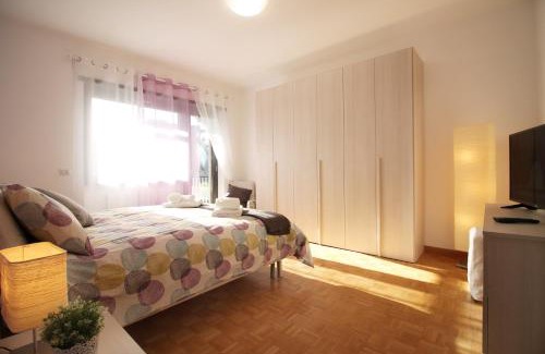 Quartiere XXXI Giuliano Dalmata Apartment | Bright Terraced Apartment with Private Parking & Great Amenities