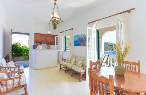 Agios Stefanos Apartment | Inviting Evanna House: Oceanfront Stay in Saint Stephanos