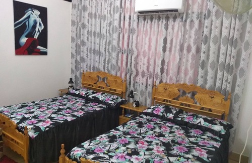 Centro Havana Hotel | Relaxing Stay at Evelio House with Spa and Family Amenities