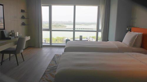 Jinfeng Qu Hotel | Experience EVEN Hotel Yinchuan Yuehai: 4-Star Comfort Awaits
