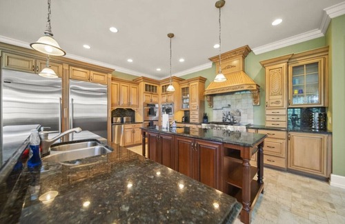 Morris House | Inviting Mansion with Pools & Lakeview for Memorable Events