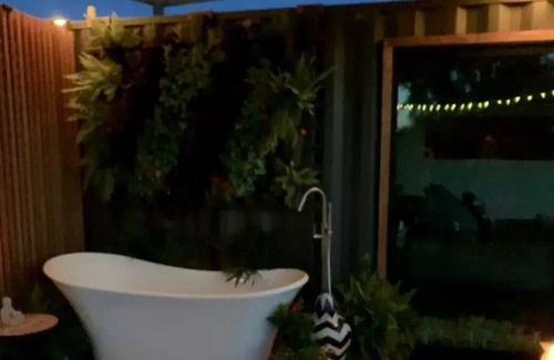 Bastrop County Cabin | Unique Container Stay: Pet-Friendly & Rated 10/10!