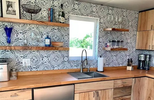 Bastrop County Cabin | Unique Container Stay: Pet-Friendly & Rated 10/10!