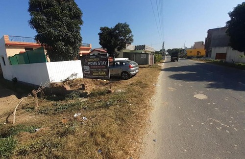 Ramnagar House | Welcoming Evergreen Homestay: Family & Pet Friendly Retreat