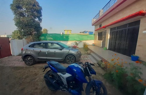 Ramnagar House | Welcoming Evergreen Homestay: Family & Pet Friendly Retreat