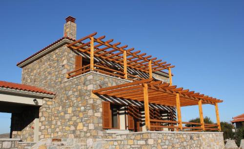 Myrina Villa | Unforgettable Evgatis Beach Apartments with Oceanfront Bliss
