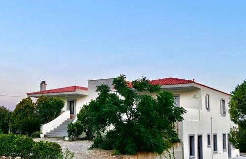 Myrina House | Beachfront Bliss at Evgatis Beach Loyskoy - Rated 9.8/10