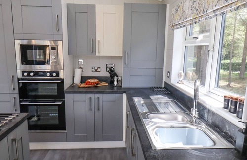 Egton Cottage | Family-Friendly Ewe Crag Beck Lodge with Garden in Whitby