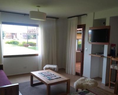 Dina Huapi Apartment | Cozy Villa Dina Huapi: Poolside Retreat for 4 Guests