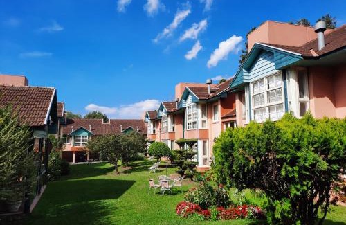 Bairro Lago Negro Apartment | Cozy Duplex in Gramado with Fireplace and Family Amenities