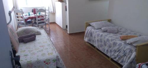 Itarare Apartment | Prime Location with Oceanfront Views for Your Getaway