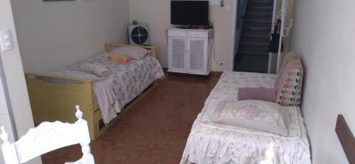 Itarare Apartment | Prime Location with Oceanfront Views for Your Getaway