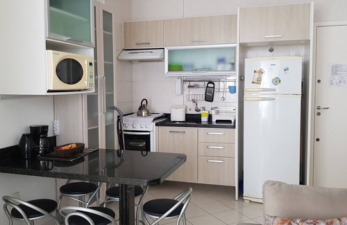 Cachoeira do Bom Jesus Apartment | Top-Rated Apartment Steps from Cachoeira do Bom Jesus Beach