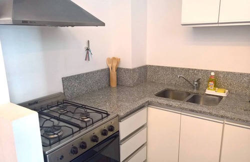 Nunez Apartment | Cozy Apartment with Balcony & Spa in Residential Area