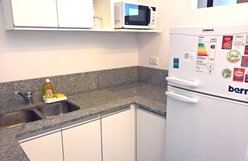 Nunez Apartment | Cozy Apartment with Balcony & Spa in Residential Area