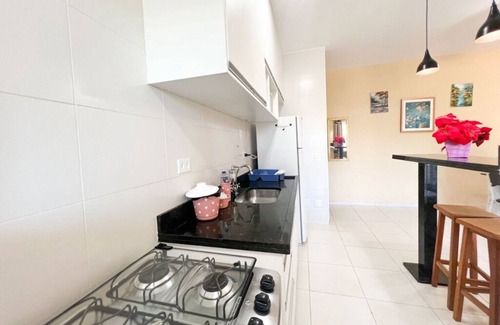 Toninhas Apartment | Inviting Apartment with Ocean View and Impeccable Cleanliness