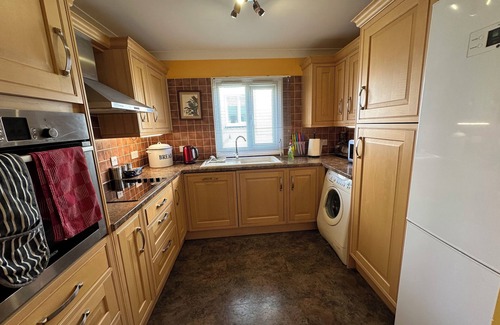 Watton Apartment | Elegant Apartment with Pool, Child-Friendly Amenities