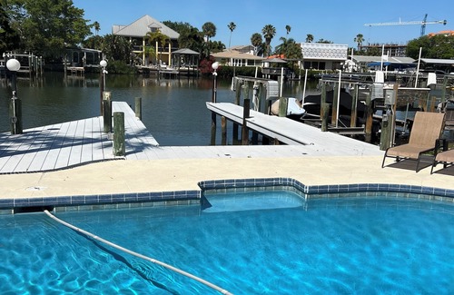 Clearwater House | Perfect Retreat for Families: Poolside Fun & Dock Access