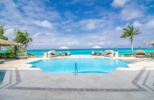 Old Fort Bay Villa | Exclusive Beachfront Mansion with Pool and Hot Tub