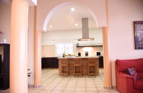 Lora Del Rio Ski Chalet | Elegant Chalet with Pool and Spa near Sevilla for 14 Guests