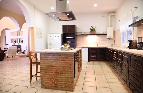 Lora Del Rio Ski Chalet | Elegant Chalet with Pool and Spa near Sevilla for 14 Guests