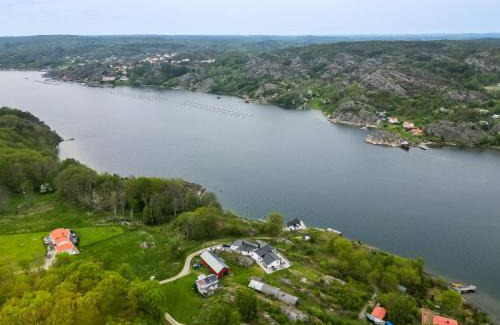 Nosund Villa | Exclusive House with Private Boathouse & Ocean Views