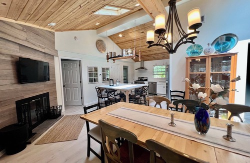 Powers Lake Villa | Exclusive Lakefront Retreat with Beach, Piers & More