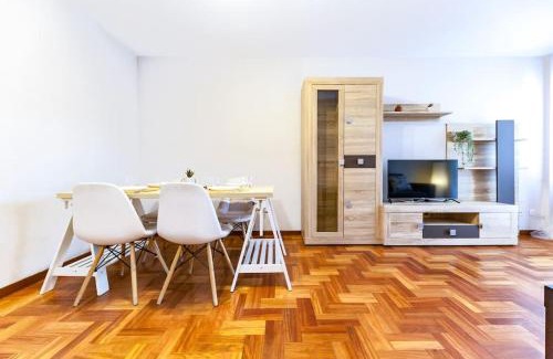 Distrito Llano Apartment | Modern Flat in Gijón: Pet & Child Friendly Stay