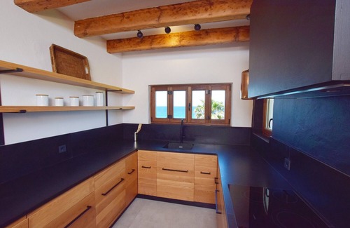 Atlanterra Ski Chalet | Beachfront Villa with Free WiFi & Unmatched Amenities