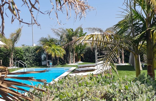 Brucoli Villa | Exclusive Villa with saltwater pool and Jacuzzi hot tub near the sea.