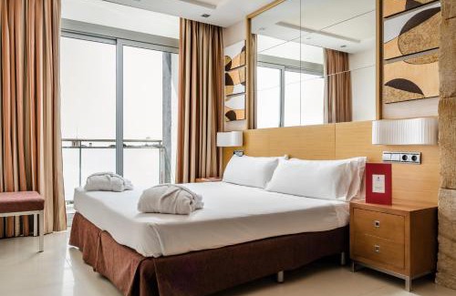 Cunit Hotel | Enjoy Exe Cunit Suites & Spa with Ocean View and Pool
