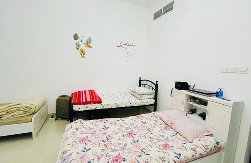 Al Mankhool House | Cozy Bedspace Exclusively for Ladies – Book Your Stay Today!
