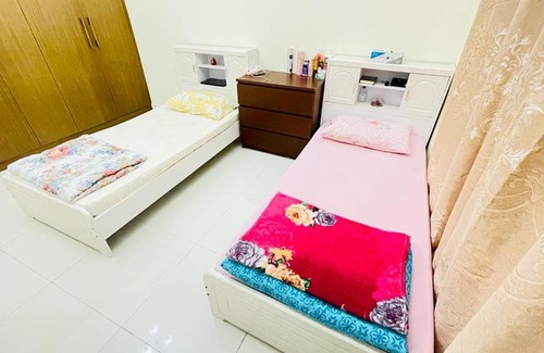 Al Mankhool House | Cozy Bedspace Exclusively for Ladies – Book Your Stay Today!