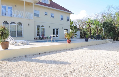 Northwest Point House | Elegant Retreat Near Seven Mile Beach with Private Pool