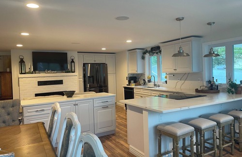 Derry House | Lakefront Haven: Hot Tub, Fire Pit & Floating Office