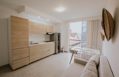 Cali Apartment | Escape to a New Apartment with City and Pool Views