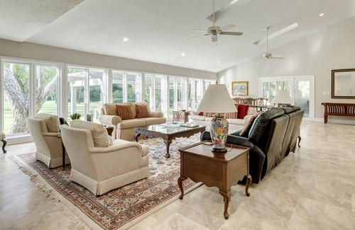 Dickinson House | Expansive home on the water with dock, large deck, shared pool & central AC