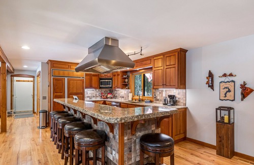 Clark Fork House | Premier Riverfront Lodge with Game Room and Dock Access