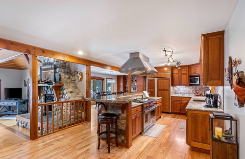 Clark Fork House | Premier Riverfront Lodge with Game Room and Dock Access