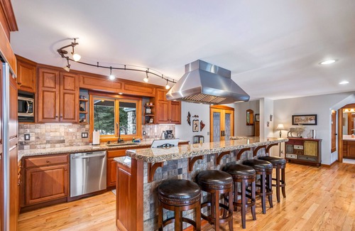 Clark Fork House | Premier Riverfront Lodge with Game Room and Dock Access