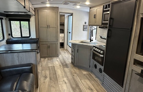 Carterville RV Rental | Indulge in Glamping with Private Hot Tub and Lake Access