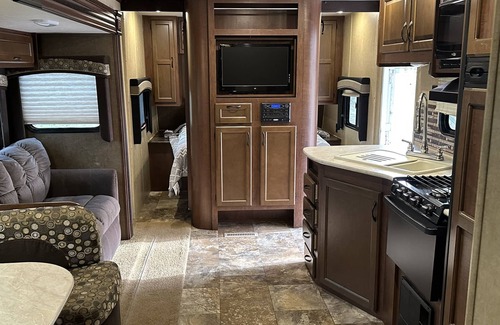 Carterville RV Rental | Indulge in Glamping with Private Hot Tub and Lake Views