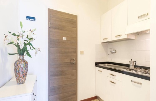 Lignano Sabbiadoro Apartment | Experience Our Inviting Flat with Spa & Pet-Friendly Amenities