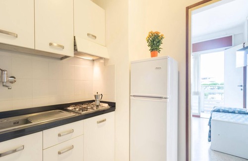 Lignano Sabbiadoro Apartment | Experience Our Inviting Flat with Spa & Pet-Friendly Amenities