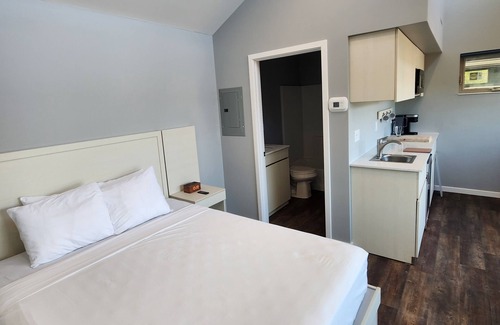 Munising Ski Chalet | Discover Munising Studio Suite 101 - Brand New & Pet Friendly