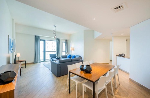 Dubai House | Relax at Expo Village Serviced Apartments with Ocean Views