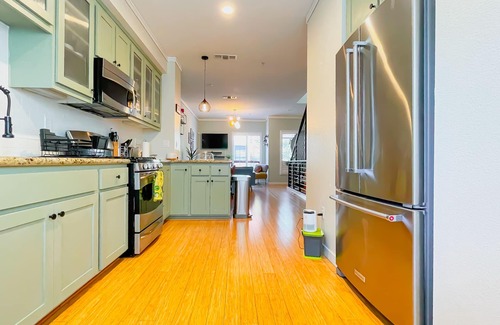 Prescott House | Elegant Trilevel Condo with 2 Master Suites & Cozy Patio